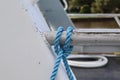 Blue Rope Knot Tied to Metal Pole on Old Boat Royalty Free Stock Photo