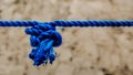 blue rope tied with a knot Royalty Free Stock Photo