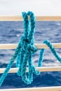 Blue Rope on White Ship Railing Royalty Free Stock Photo