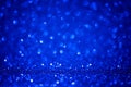 Blue round bokeh Background with Bright glitter Lights for Valentine`s Day or Women day. Defocused shine texture for greeting card