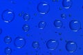 Blue round water droplets background with pixel pattern. Royalty Free Stock Photo