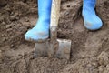 Blue rubber boots, men's, shovel Royalty Free Stock Photo