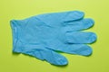 Blue rubber medical glove