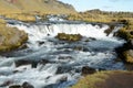 Blue running river in Iceland on a sunny day Royalty Free Stock Photo