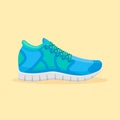 Blue running shoes isolated on yellow background. Royalty Free Stock Photo