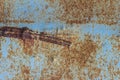 Blue rusted metal background. A rusty and scratched painted metal wall. Rusty metal background with streaks of rust