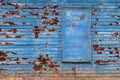 Blue rusty barn farm building wall boarded window Royalty Free Stock Photo