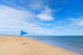 Blue flag on Gruissan plage in France Royalty Free Stock Photo