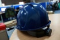 Blue safety helmet complete with suspension and chin strap