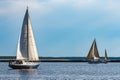 Blue sailboat at river