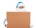 Blue santa claus and part of empty bulletin board