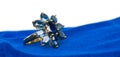 Blue Sapphire Jewel or gems ring on velvet bag. Collection of natural gemstones accessories. Studio shot