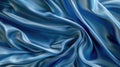 Blue satin fabric texture with elegant waves. Abstract luxurious background Royalty Free Stock Photo