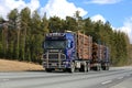 Blue Scania Logging Truck Hauls Wood