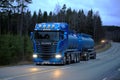 Blue Scania R580 on Dark Rural Road Royalty Free Stock Photo