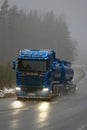 Blue Scania R580 Tank Truck on Foggy Road, Vertical View Royalty Free Stock Photo