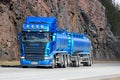 Blue Scania Tank Truck with Rock Face Background Royalty Free Stock Photo