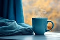 Blue scarf blue mug window. Generate Ai Royalty Free Stock Photo