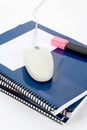 Blue school textbook and computer mouse Royalty Free Stock Photo