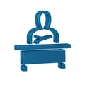 Blue Schoolboy sitting at desk icon isolated on transparent background.