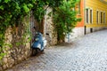 Blue scooter on a cozy street of the Old Town of Budapest. Hungary Royalty Free Stock Photo