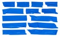 Blue scotch tape  large set of adhesive packaging tape  crumpled torn stripes on white background Royalty Free Stock Photo