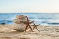 Blue Sea on Background Selective focus, zen stones on sea beach, meditation, spa, harmony, calm, balance concept Royalty Free Stock Photo