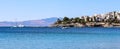 Blue sea, boats, mountains and small town on the coast of the Aegean sea. Summer holidays concept Royalty Free Stock Photo