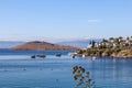 Blue sea, boats, mountains and small town on the coast of the Aegean sea. Summer holidays concept Royalty Free Stock Photo