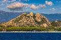 Blue sea and the characteristic caves of Cala Luna, a beach in the Golfo di Orosei, Sardinia, Italy. Big sea caves in the Royalty Free Stock Photo