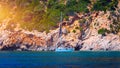 Blue sea and the characteristic caves of Cala Luna, a beach in the Golfo di Orosei, Sardinia, Italy. Big sea caves in the Royalty Free Stock Photo