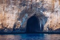 Blue sea and the characteristic caves of Cala Luna, a beach in the Golfo di Orosei, Sardinia, Italy. Big sea caves in the Royalty Free Stock Photo