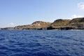 Blue sea and characteristic caves of Cala Luna Golfo di Orosei Sardegna or Sardinia Italy Royalty Free Stock Photo