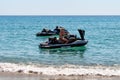 Blue sea and a jet ski floating on Aegean sea. Royalty Free Stock Photo