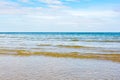 Blue sea and a moving reflection of sunlight