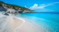 The blue sea, sand and rocks on a beautiful Mediterranean beach