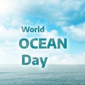 Blue sea and sky with clouds, with the text world ocean day. Concept of world ocean day and conservation of the environment Royalty Free Stock Photo