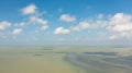 Blue sea and sky with clouds, view from the drone. Royalty Free Stock Photo