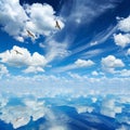 Blue sea and sky, white clouds, sunny weather, three seagulls fl Royalty Free Stock Photo