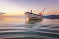 Blue sea at sunset, boat fishing Shore landscape bay. Summer scenery. Blue water.