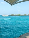 Blue sea water with a big ship in nature Royalty Free Stock Photo