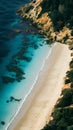 Blue sea water meets sandy beach, tranquil coastal scene