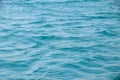 Blue sea water surface with ripples and waves Royalty Free Stock Photo