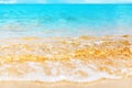 Blue sea wave splash closeup, ocean tide, turquoise water, white foam, golden yellow sand, sunny tropical island beach nature Royalty Free Stock Photo