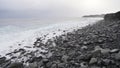 Waves crashing on a rocky seaside in Hawaii Royalty Free Stock Photo