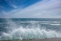 Blue sea with waves and sky with clouds Royalty Free Stock Photo