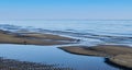 Blue sea in winter in the Venetian lagoon of Caorle, Venice