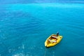 Blue sea and yellow ship Royalty Free Stock Photo