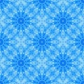 Blue seamless fractal based tile with a circular flower or mandala design