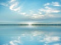 blue tropical blue sunset at sea light sun reflection on ocean water white fluffy clouds at sky beautiful nature landscape Royalty Free Stock Photo